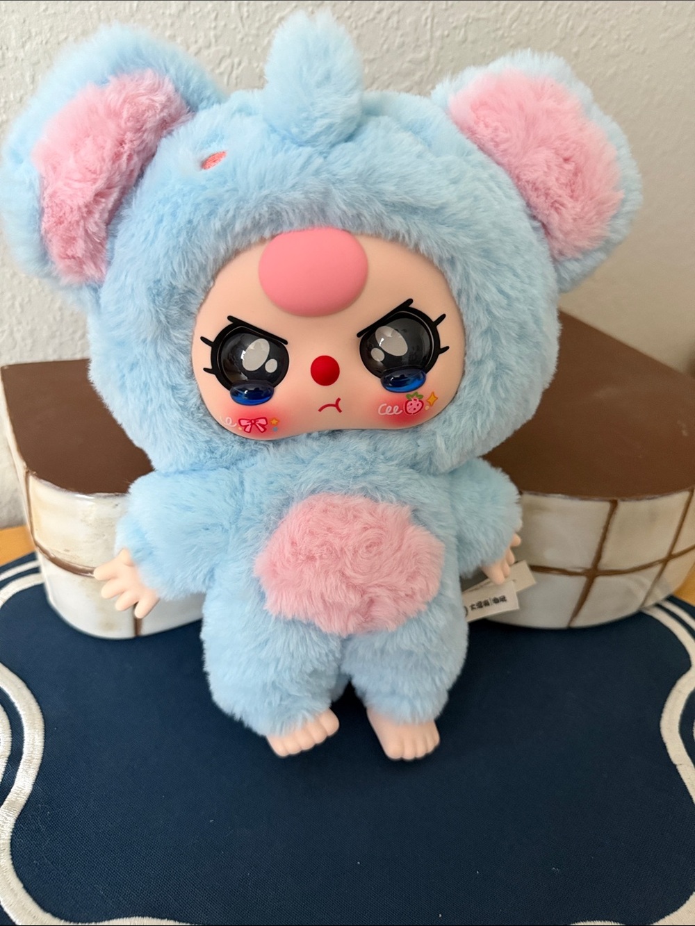 Baby Three 400% elephant outfit with teary eyes
